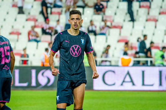 Dennis Hadzikadunic of Malmö FF celebrates