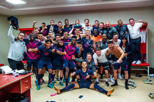 The team celebrates