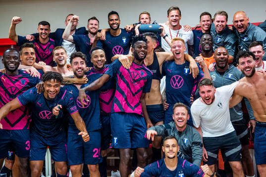 The team celebrates