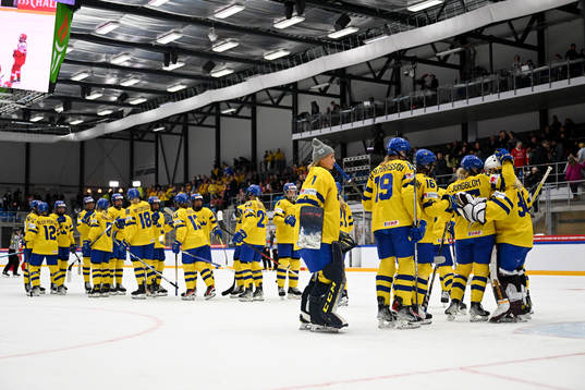 Players of Sweden celebrate