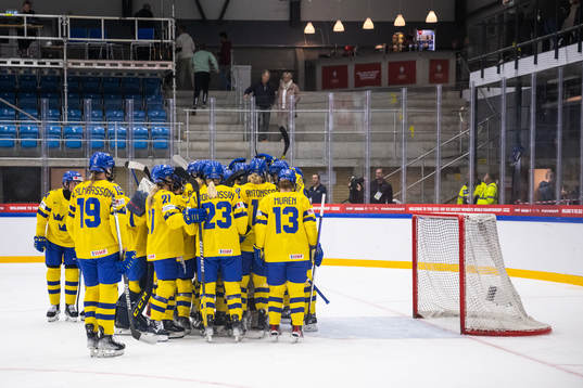 Players of Sweden celebrate
