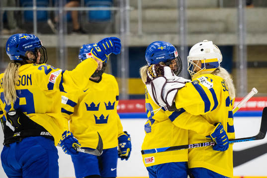 Mina Waxin and goaltender Emma Söderberg of Sweden
