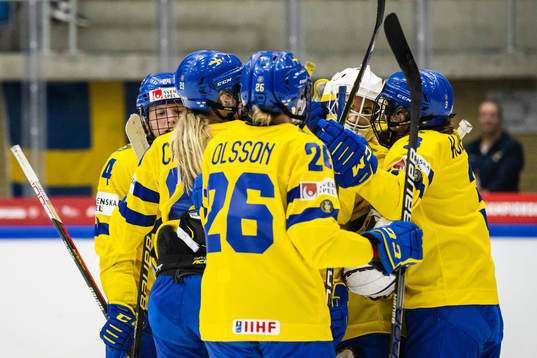 Players of Sweden celebrate with goaltender Emma Söderberg