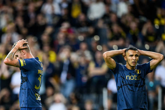 Mikael Lustig and Nabil Bahoui of AIK look dejected
