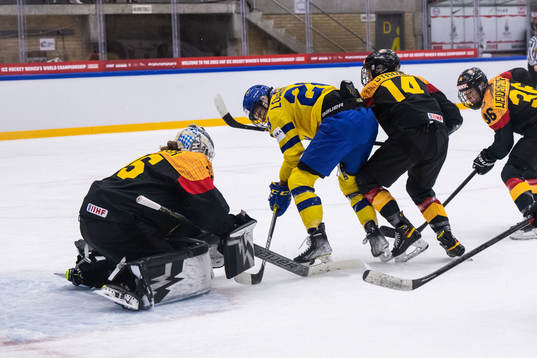 goaltender Sandra Abstreiter, Carina Strobel of Germany and