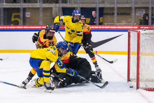 Hanna Olsson of Sweden scores 2-0 behind goaltender Sandra