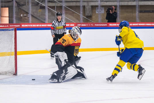Mira Jungåker of Sweden scores a penalty behind goaltender