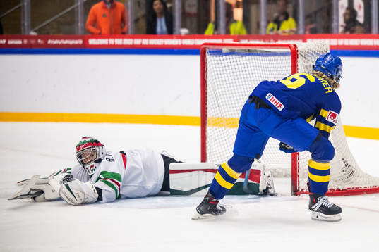 goaltender Aniko Nemeth of Hungary and Mira Jungåker of