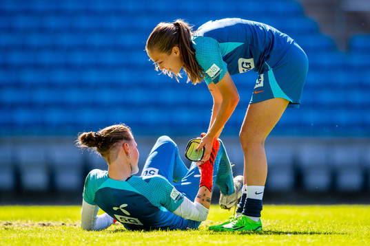Goalkeeper Rugile Maria Rulyte and Guro Reiten of the