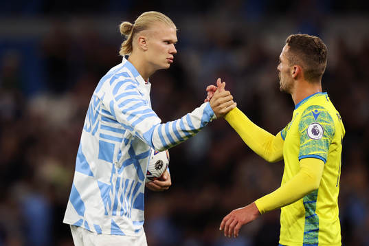 Erling Braut Haaland of Manchester City and Harry Toffolo