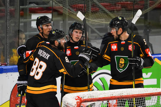 Bartosz Fraszko of Katowice celebrate with team mates