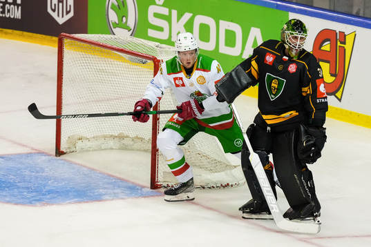 Oskar Stål Lyrenäs of Rögle and goalkeeper John Murray