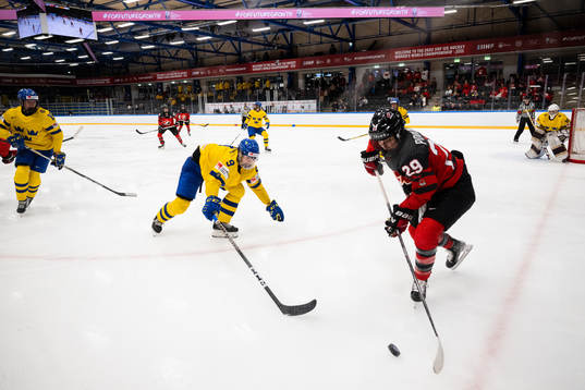 Jessica Adolfsson of Sweden and Marie-Philip Poulin of