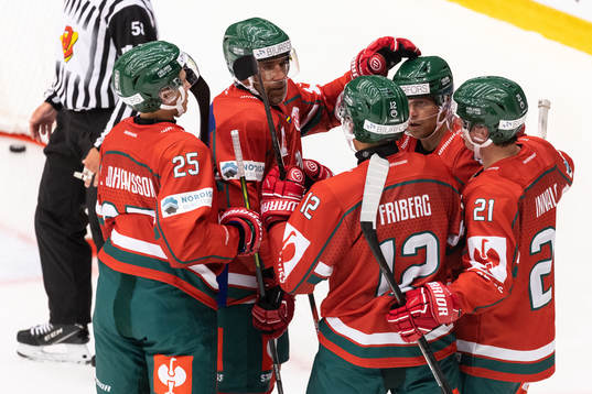 Max Friberg of Frölunda celebrate with team mates