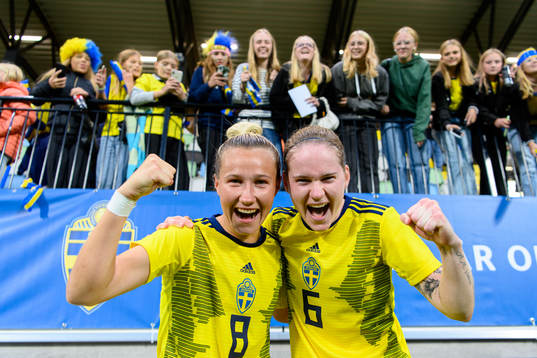 Marika Bergman Lundin and Linn Vickius of Sweden celebrate