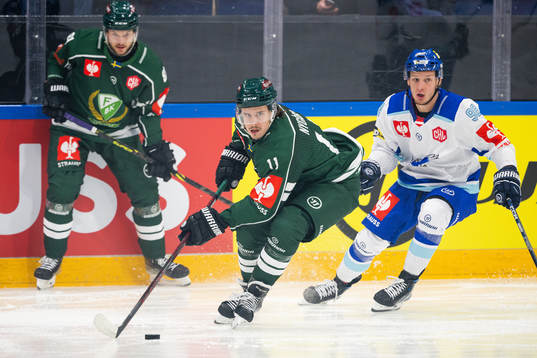Joakim Nygård of Färjestad and Blaz Tomazevic of Villach