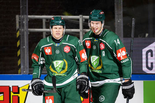 Daniel Viksten and Victor Ejdsell of Färjestad celebrate
