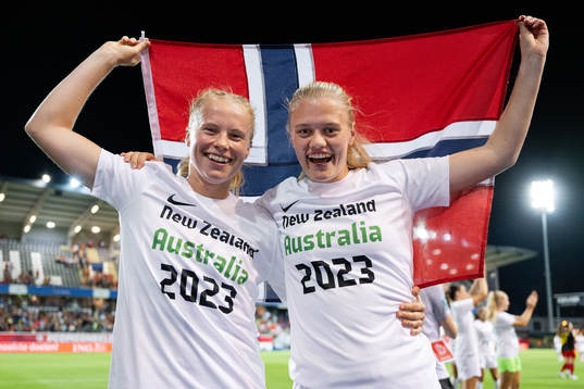 Julie Blakstad and Mathilde Harviken of Norway celebrate
