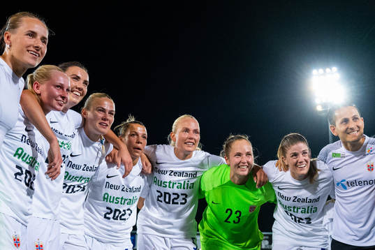 Players and staff of Norway celebrate