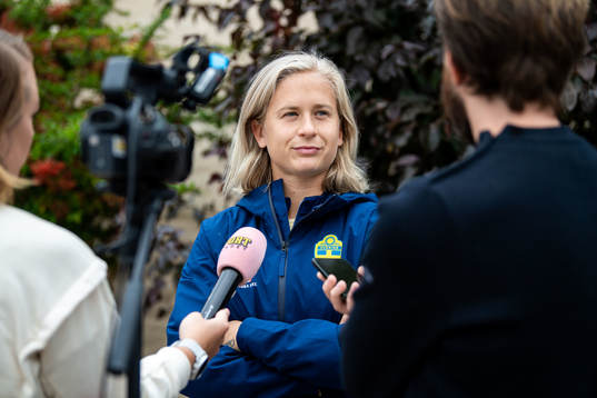 Filippa Curmark is interviewed by the media