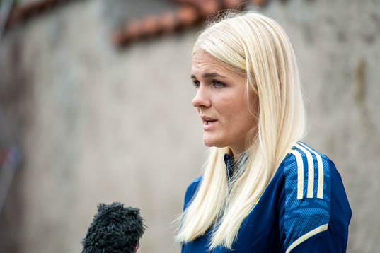Goalkeeper Emma Holmgren is interviewed by the media