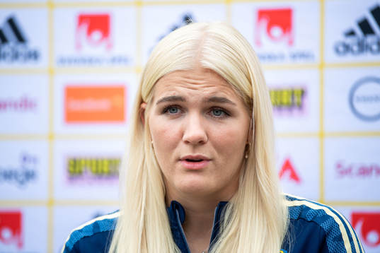 Goalkeeper Emma Holmgren is interviewed by the media