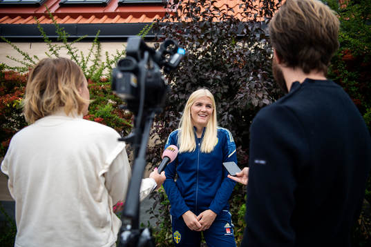 Goalkeeper Emma Holmgren is interviewed by the media