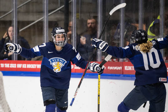 Susanna Tapani and Elisa Holopainen of Finland celebrate