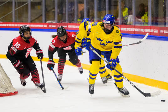 Sara Hjalmarsson of Sweden agsinst Yoshino Enomoto and