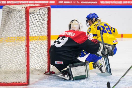 goaltender Miyuu Masuhara of Japan and Michelle Löwenhielm
