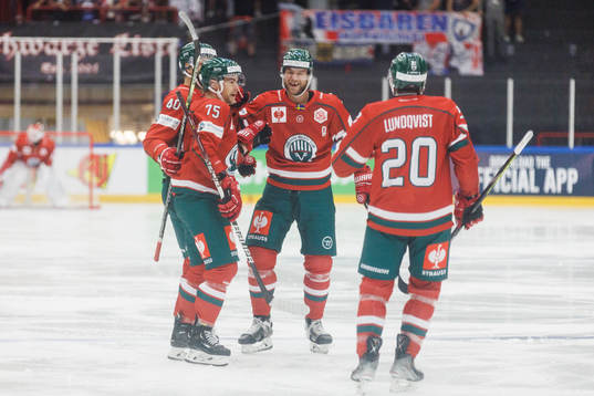 Christian Folin of Frölunda celebrates with teammates