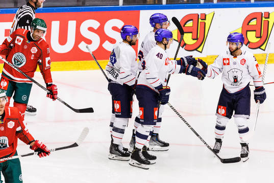 Korbinian Geibel of Eisbären Berlin celebrate with
