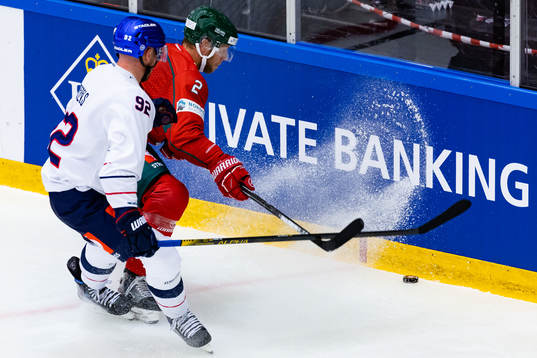 Marcel Noebels of Eisbären Berlin and Christian Folin of