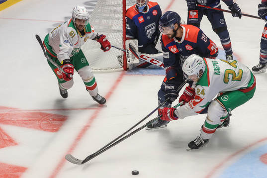 Marco Kasper and Ludwig Larsson of Rögle against Daniel