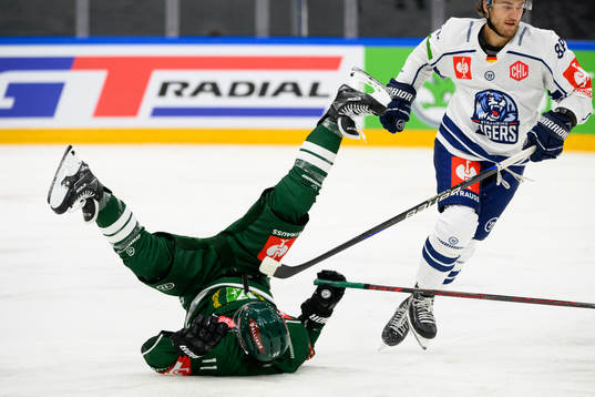 Joakim Nygård of Färjestad and JC Lipon of Straubing