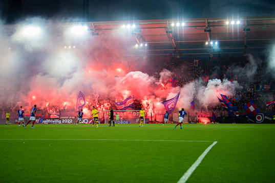 Spectators in the stands celebrates