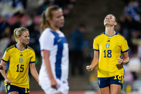 Rebecka Blomqvist and Fridolina Rolfö of Sweden celebrate