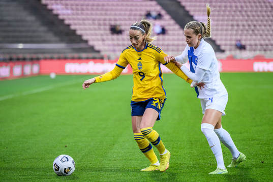 Kosovare Asllani of Sweden and Ria Öling of Finland