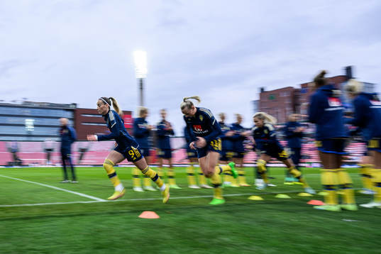 Kosovare Asllani and Stina Blackstenius of Sweden