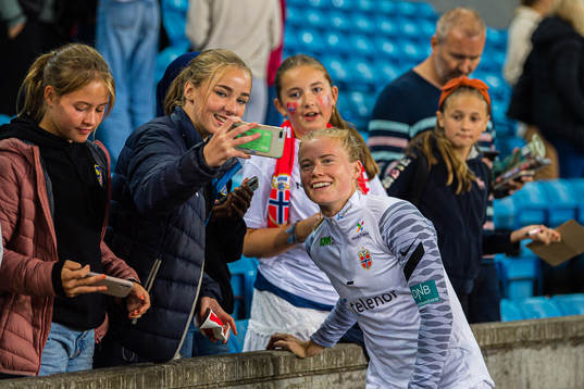 Julie Blakstad of Norway taking a selfie ith a fan