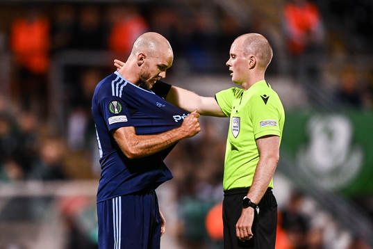 Marcus Danielson of Djurgården and Referee Ivar Orri
