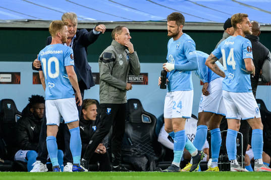 Anders Christiansen and Head coach Åge Hareide of Malmö FF