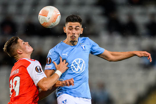 Vitor Oliveira of Braga and Dennis Hadzikadunic of Malmö FF