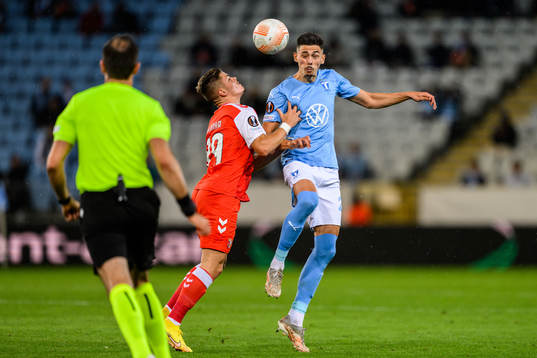 Vitor Oliveira of Braga and Dennis Hadzikadunic of Malmö FF