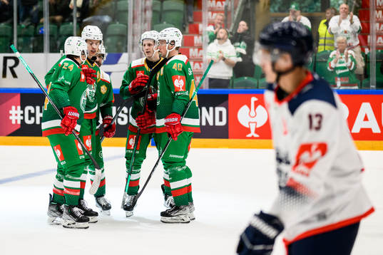 Tony Sund of Rögle celebrate with teammates