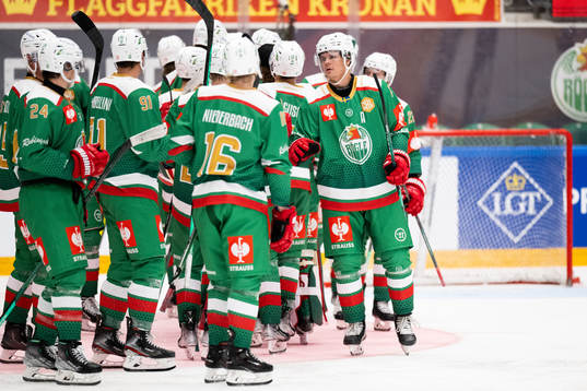 Erlend Lesund of Rögle celebrate with teammates