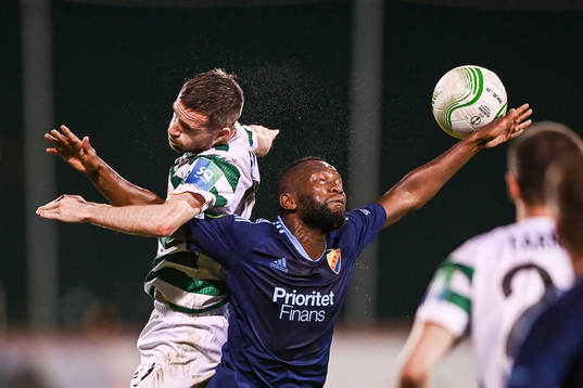 Jack Byrne of Shamrock Rovers and Emmanuel Justine Rabby