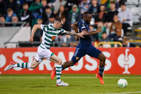Sean Kavanagh of Shamrock Rovers and Emmanuel Justine Rabby
