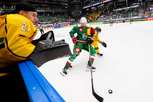 Linus Sjödin of Rögle in action with Teemu Pulkkinen of