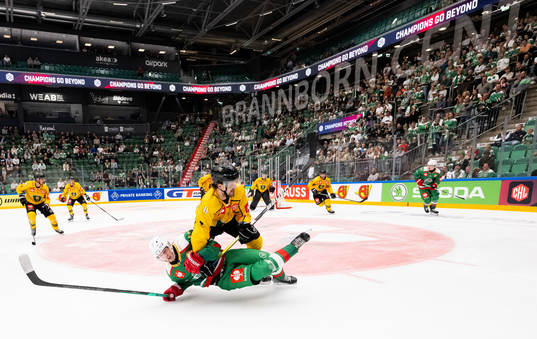 Linus Sjödin of Rögle in action with Teemu Pulkkinen of